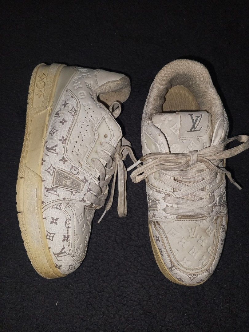 Louis Vuitton LV Trainer Sneakers White Monogram (Category: Sneakers & Footwear) located in Magalang. Submitted by zeiansoria64090 (Listing ID 1463217608, Image 1). Description: - Louis Vuitton LV Trainer sneakers - Color: White with Grey Monogram pattern - Size: 7 UK / 40 EUR / 250 CM - Made in Vietnam - Perfect for adding a touch of luxury to your streetwear.