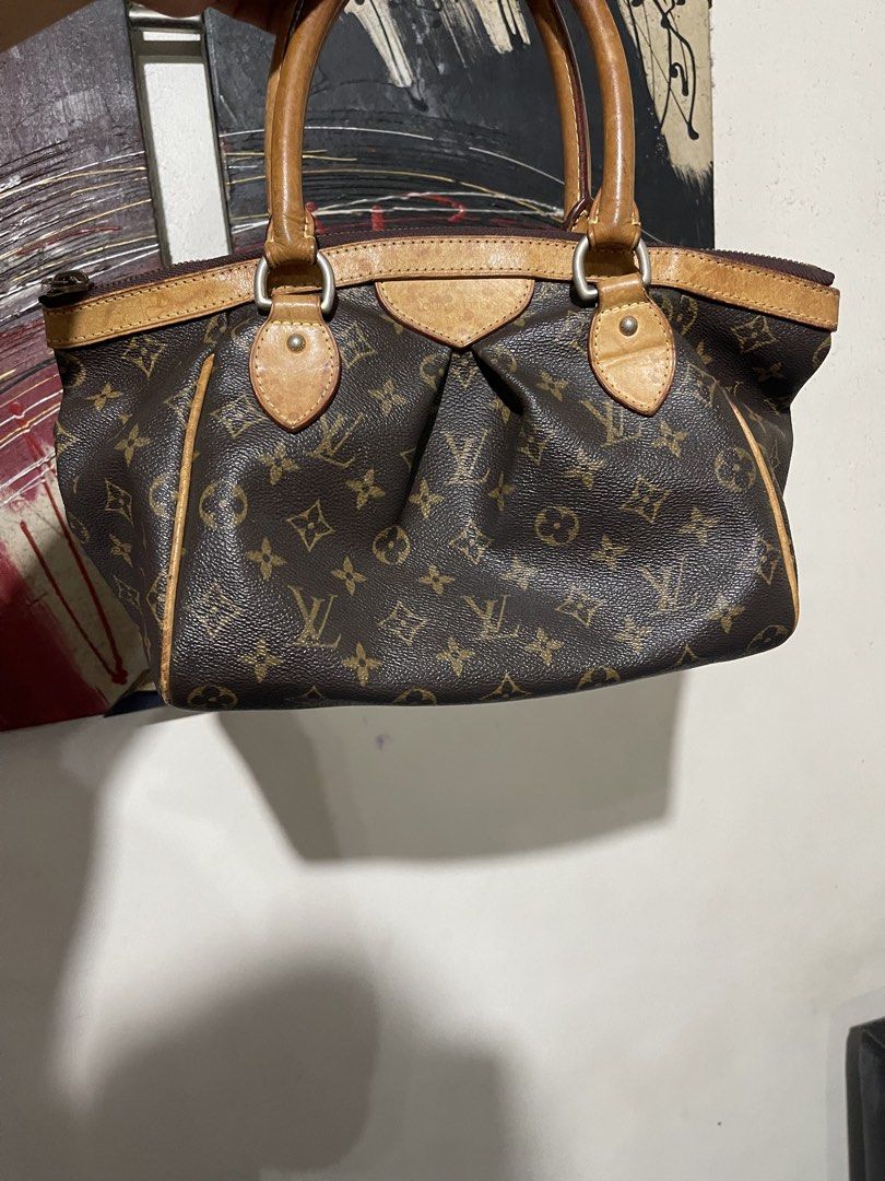 Louis Vuitton Monogram Canvas Handbag (Category: Luxury Bags & Wallets) located in Mandaluyong City. Submitted by mark2pac (Listing ID 1463154093, Image 1). Description: - Authentic Louis Vuitton handbag - Classic Monogram canvas with elegant leather trim - Secure zipper closure - Interior leather tag: 'LOUIS VUITTON PARIS made in France' - Date code: TH0072 - Ideal everyday bag.