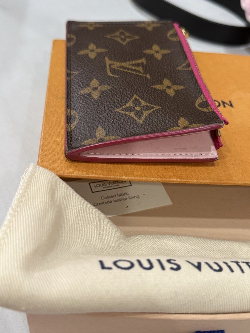 Louis Vuitton Monogram Canvas Card Holder Pink Trim (Category: Luxury Bags & Wallets) located in Quezon City. Submitted by closet24 (Listing ID 1463189865, Image 3). Description: - Authentic Louis Vuitton card holder - Classic monogram canvas with vibrant pink trim and interior - Adorable flower charm included - Secure zipper closure - Comes with original box and dust bag -signs of use on corners see photos Hardware excellent condition Slightly n