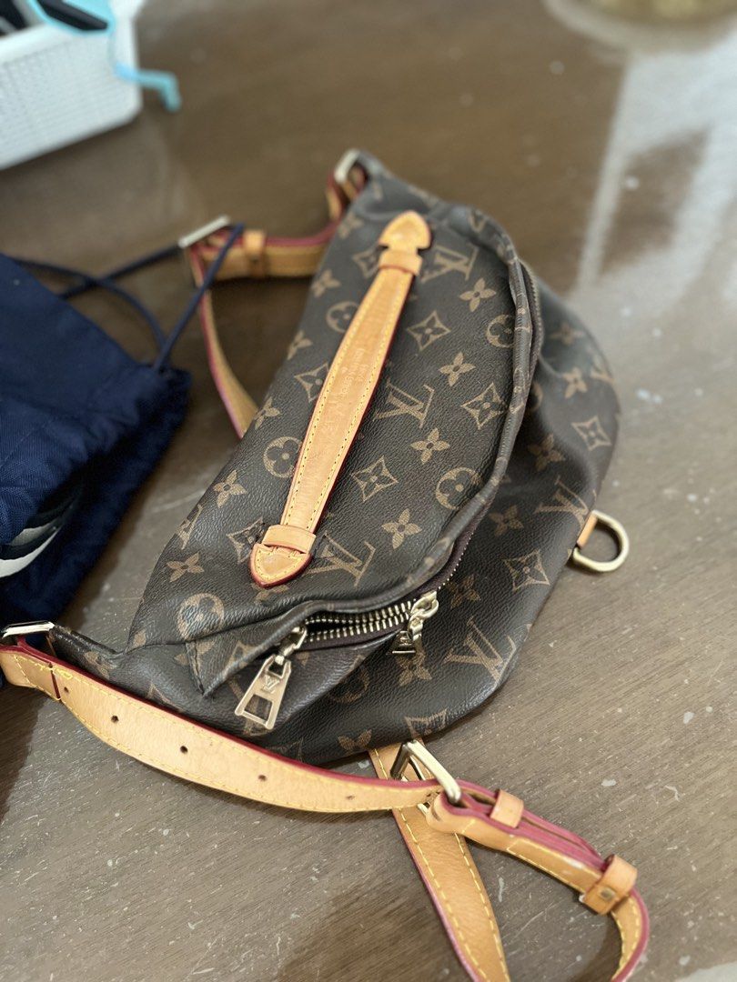 Louis Vuitton Monogram Canvas Bumbag (Category: Luxury Bags & Wallets) located in General Trias. Submitted by mhayeeei (Listing ID 1463250392, Image 1). Description: - Classic Louis Vuitton Bumbag in Monogram Canvas - Genuine Leather Trim - Adjustable Strap for Comfortable Fit - Secure Zipper Closure - Ideal for Hands-Free Convenience - Note: Shows some signs of wear on the leather strap and trim.