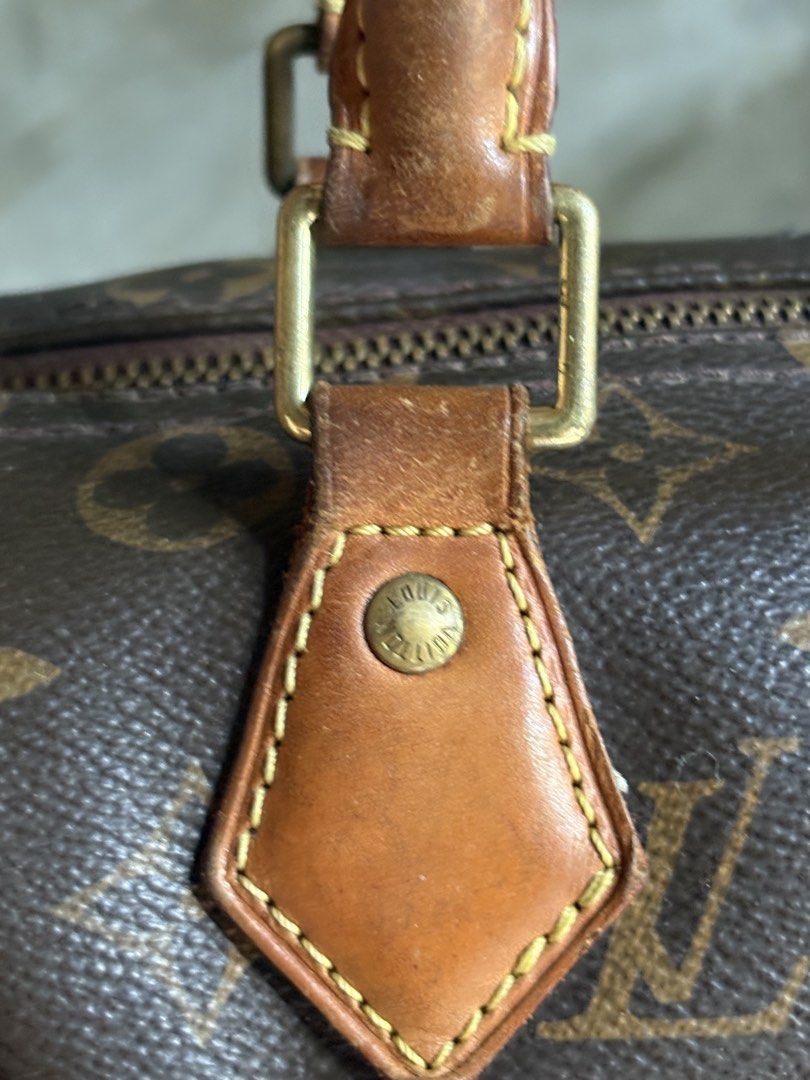 Louis Vuitton Monogram Speedy Bag (Category: Luxury Bags & Wallets) located in Surigao. Submitted by new.maria (Listing ID 1463145044, Image 2). Description: - Classic Louis Vuitton Speedy bag - Monogram canvas with leather trim and handles - Zipper closure - Date code: BA2125 - Timeless and iconic piece.