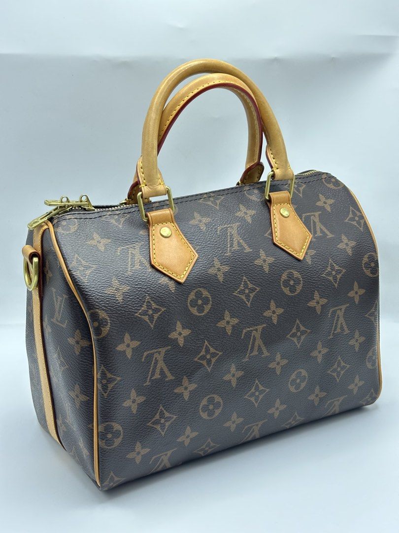 Louis Vuitton Speedy Monogram Canvas Handbag (Category: Luxury Bags & Wallets) located in Manila. Submitted by dough_lux (Listing ID 1463162685, Image 1). Description: - Classic Louis Vuitton Speedy bag - Monogram canvas with vachetta leather trim and handles - Gold-tone hardware with iconic LV zipper pull and padlock - Timeless and versatile piece - Ideal for everyday use or travel - Approximately 30cm in size.