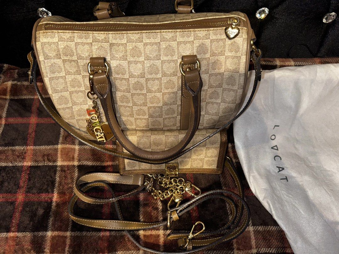 Lovcat bag (Category: Luxury Bags & Wallets) located in Makati City. Submitted by rozanovxhollander (Listing ID 1463255976, Image 2). Description: FOR SALE: Lovcat Paris Heart Tote Bag + Long Wallet BUNDLE COLLECTOR’S EDITION RARE SUPER STEAL SWEAR!!! THIS SELLS FOR LIKE 14K Lovcat is a great-quality Korean brand offering sophisticated designs at reasonable price points—typically ranging from $200 to $450 for new bags, with older or vintage desig