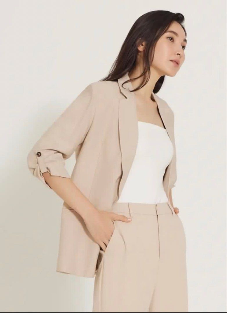 Love, Bonito Beige Linen Blend Blazer (Category: Coats, Jackets and Outerwear) located in Baguio. Submitted by tresmariascloset13 (Listing ID 1463231052, Image 1). Description: - Lightweight beige blazer from Love, Bonito - Features roll-up sleeves with button detail - Two functional front pockets - Ideal for layering over tops or dresses - Versatile for dressing up or down - Comfortable material.