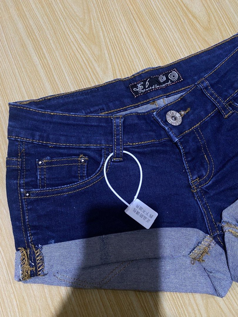 Low rise folded micro short dark blue (Category: Shorts) located in Caloocan City. Submitted by blairbyysha (Listing ID 1463162385, Image 3). Description: •Size 26-27 •Length 7.5 •Low rise | Brand new.