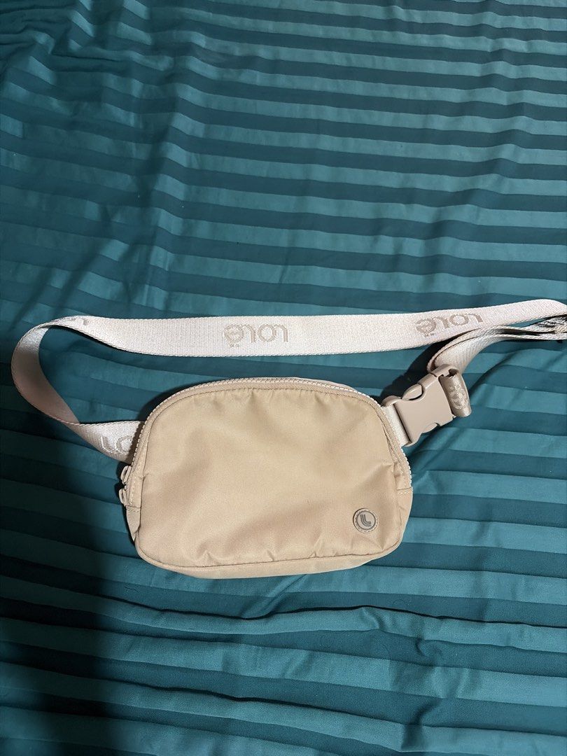 LOLE Everywhere Belt Bag - Beige (Category: Cross-body Bags) located in Las Pinas. Submitted by ces0427 (Listing ID 1463326251, Image 2). Description: - Beige Lululemon Everywhere Belt Bag - Water-repellent fabric - Multiple interior pockets for organization - Adjustable strap for a comfortable fit - Ideal for everyday use, travel, and workouts - Easy to clean and durable - Fits essentials like phone, wallet, and keys.
