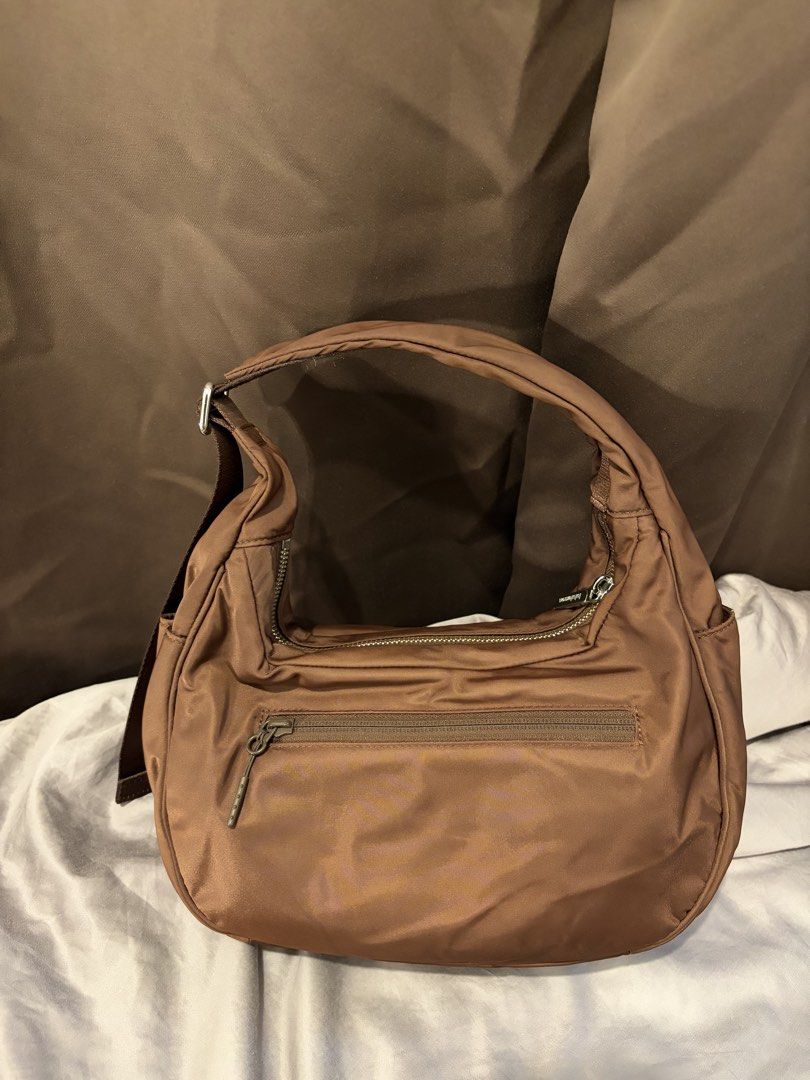 Lululemon Shoulder Bag 4L Dark Brown (Category: Shoulder Bags) located in Manila. Submitted by issathings (Listing ID 1463302551, Image 2). Description: definitely like new rush selling lalamove or LBC COP.