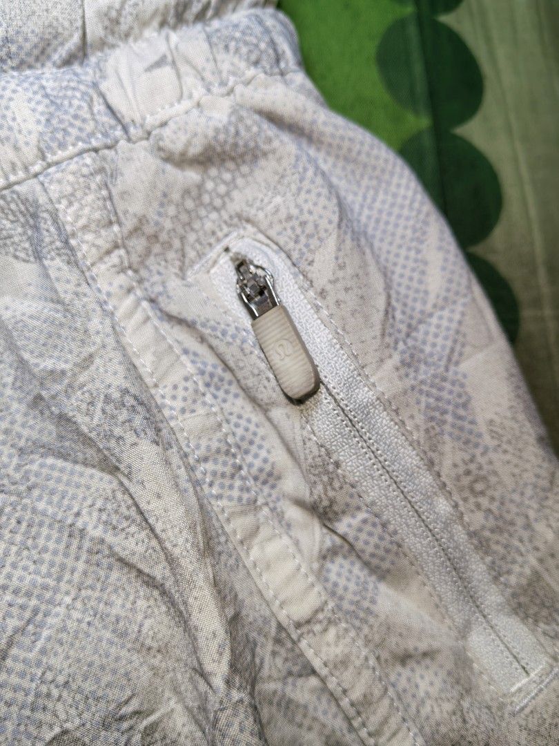 Lululemon Speed Up Shorts Size 6 Grey Patterned (Category: Shorts) located in Mabitac. Submitted by kitothrifty (Listing ID 1463212930, Image 2). Description: - Lululemon Speed Up Shorts - Size: 6 - Color: Cool Grey with abstract pattern - Features a convenient side zippered pocket - Made with lightweight and breathable material - Ideal for running, workouts, and active pursuits.
