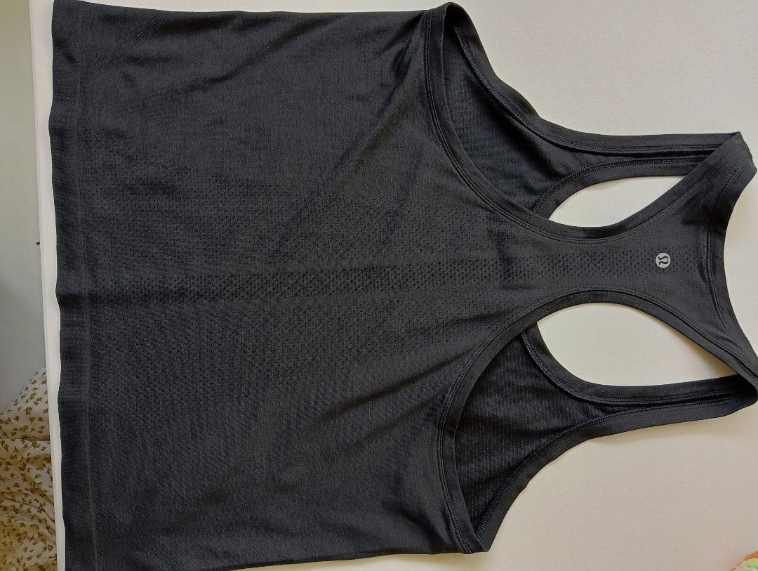 Lululemon Tank Top Swiftly Tech Racerback (Category: Activewear) located in Rizal. Submitted by timeless_shop (Listing ID 1463200162, Image 3). Description: Original Lululemon Swiftly Tech Racerback Tank 📏 Size: Dot Size 10 , Fit Bust (36-38) 📝 Details: - Length: 23 inches - Width: 18 inches pit-to-pit - Fabric: Seamless, lightweight & sweat-wicking 💨 - hindi mainit ✨ Condition: 9/10 Good Condition - Maayos at malinis - Like New, hindi laspag 