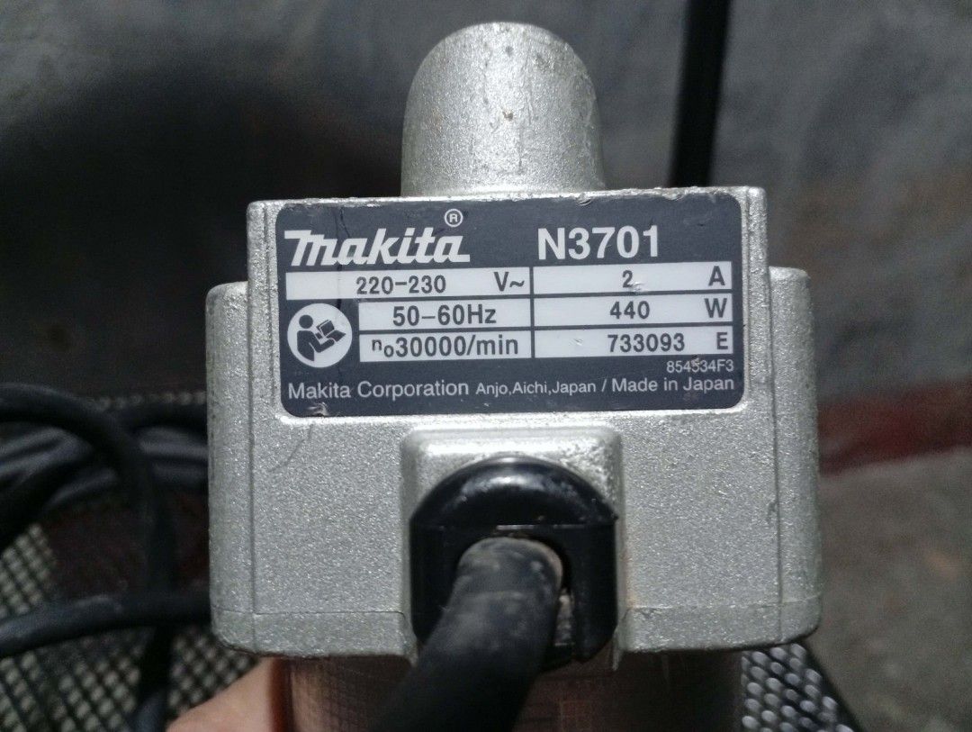 Makita N3701 Router Trimmer with Bits (Category: Networking) located in Rizal. Submitted by gonprix (Listing ID 1463258066, Image 1). Description: - Makita N3701 Router Trimmer - Power: 220-230V, 50-60Hz, 440W - Max Speed: 30,000 RPM - Includes: 2 router bits - Condition: Tested and working - Ideal for: Woodworking projects.