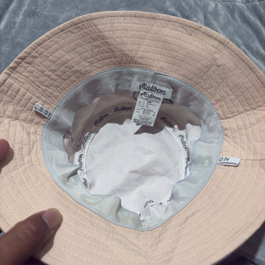 Malbon Bucket Hat (Category: Caps & Hats) located in Alburquerque. Submitted by abj_thriftshop (Listing ID 1463194993, Image 3). Description: need wash lang.