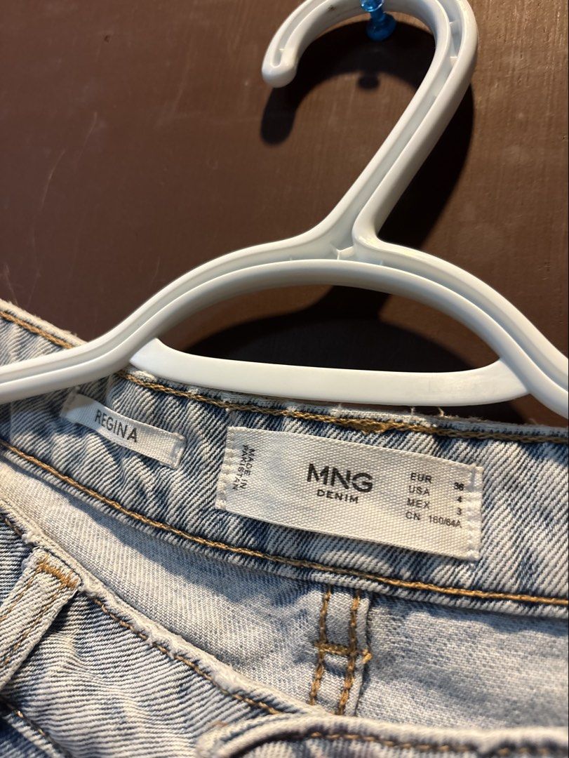 Mango — Mom Jeans (Category: Jeans) located in Paranaque City. Submitted by margauxm (Listing ID 1463265422, Image 2). Description: [MANGO — Mom Jeans] — US4 Size — Very well-used! In slightly good condition — Can easily be dressed up or dressed down — One of my favorite denim jeans :( — Has green paint stains, and a hole at the back, see photos! RFS: Decluttering.