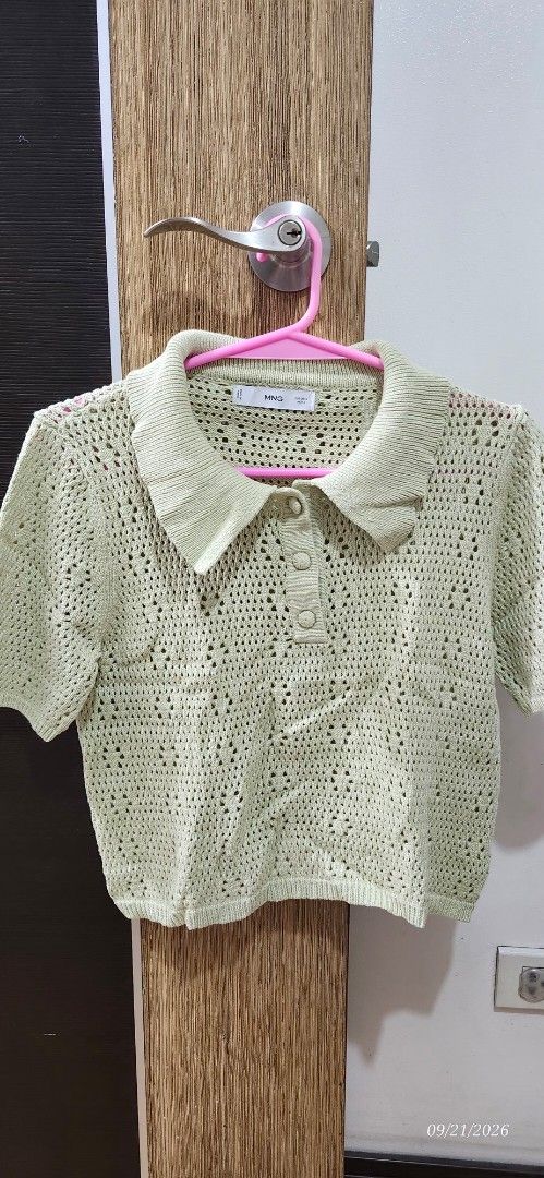 Mango Green Knit Sweater Size G (Category: Coats, Jackets and Outerwear) located in Manila. Submitted by atan2025 (Listing ID 1463225852, Image 1). Description: - Light green knit sweater from Mango - Features a textured pattern with stylish cutouts - Classic collar with button details at the neckline - Size G (MEX) - Made in China.