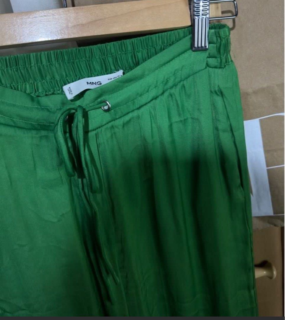 Mango Green Wide Leg Satin Pants (Category: Other Bottoms) located in Paranaque City. Submitted by arolabs (Listing ID 1463150379, Image 3). Description: - Brand: Mango - Material: Satin - Color: Green - Style: Wide leg pants - Features: Elastic waistband with drawstring - Comfort: Super comfy and chic - Versatility: Great for dressing up or down, pair with a cute top for a complete outfit..
