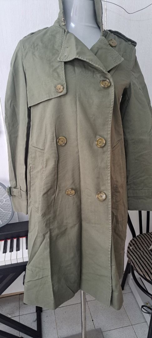 Mango olive green trench coat MEDIUM (Category: Coats, Jackets and Outerwear) located in Manila. Submitted by rsamselleracc_fire (Listing ID 1463163637, Image 1). Description: Sf to be shouldered by buyer MOP: GCASH MOD: lalamove .