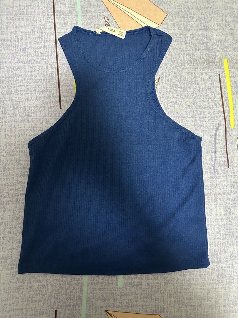 Mango Ribbed Tank Top - Blue (Category: Sleeveless) located in Manila. Submitted by joan.here (Listing ID 1463225394, Image 1). Description: Brand: mango Rfs: decluttering Mop: bank transfer Delivery: sf c/o buyer Loc: tondo manila .