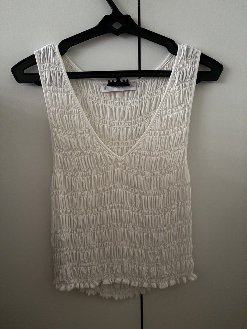 mango cream ruched v neck sleeveless top (Category: Sleeveless) located in Makati City. Submitted by amandumps (Listing ID 1463204475, Image 1). Description: fabric is slightly see through.