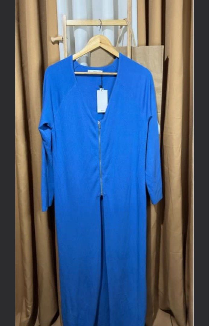 Mango Zipped Knit Cardigan Sky Blue (Category: Coats, Jackets and Outerwear) located in Paranaque City. Submitted by arolabs (Listing ID 1463150527, Image 3). Description: - Brand: Mango - Color: Blue - Style: Knit Cardigan - Features: Zip-up front, long flowing silhouette, high slit - Styling: Great for layering, looks good open over pants - Condition: Brand new with original tags attached.
