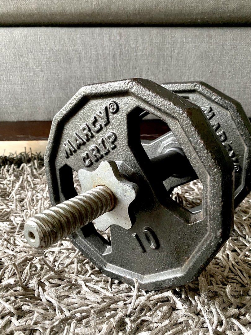 Marcy Grip Adjustable 20lbs Dumbbells (Pair) (Category: Weights & Dumbbells) located in Makati City. Submitted by lucid_soul (Listing ID 1463178877, Image 1). Description: - Pair of Marcy Grip dumbbells - 20lbs each (40lbs total) - Durable cast iron construction - Knurled handles for secure grip - Ideal for home fitness routines - Selling as a set.