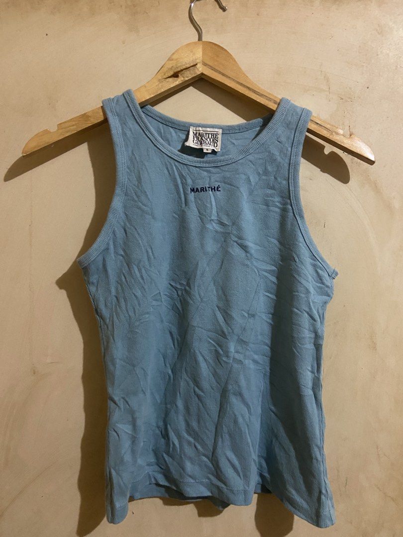 MARITHE FRANCOIS GIRBAUD Paris Blue Ribbed Tank Top Size S (Category: Sleeveless) located in Don Carlos. Submitted by doubleethrifted (Listing ID 1463324412, Image 1). Description: - Marithe Francois Girbaud ribbed tank top - Authentic Paris label - Size: S - Color: Blue - Classic and simple design - Versatile for layering or wearing alone - Comfortable ribbed texture.