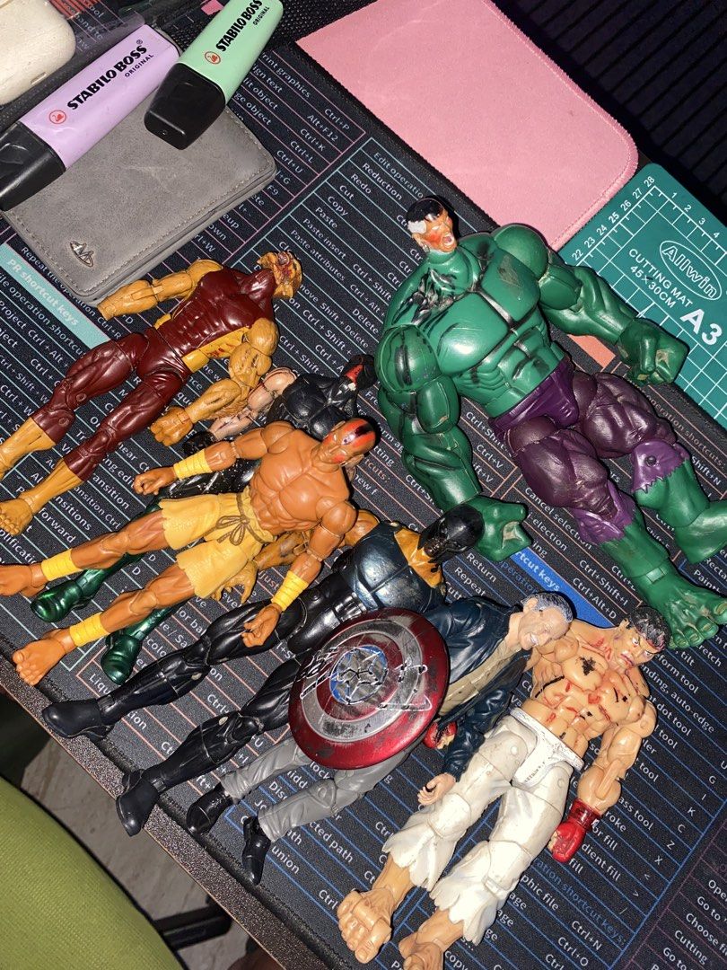 Marvel & Street Fighter Action Figures Lot (Category: Figurines & Statues) located in Davao. Submitted by thriftarchive_dvo (Listing ID 1463263798, Image 1). Description: - Action figure collection for sale - Includes Hulk, Captain America (with shield), and other characters - Features Street Fighter characters like Ryu - Ideal for collectors - Sold as a lot (all figures together).