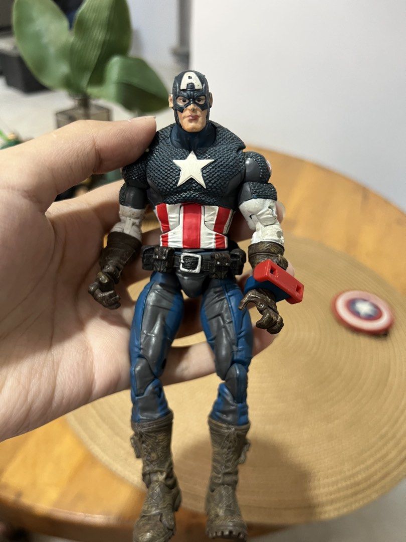 Marvel Captain America Action Figure with Shield (Category: Figurines & Statues) located in Bocaue. Submitted by kwon_017 (Listing ID 1463124315, Image 3). Description: - Captain America action figure - Includes iconic shield with back straps - Highly articulated for dynamic posing - Great addition to any Marvel collection - Note: Shield has minor signs of wear.