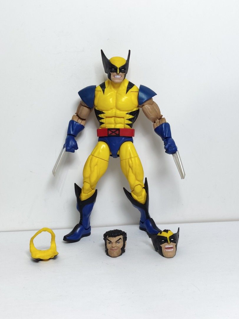 Marvel Legends Wolverine Action Figure with Accessories (Category: Figurines & Statues) located in Abucay. Submitted by lxtoyverse (Listing ID 1463139082, Image 1). Description: - Marvel Legends Wolverine action figure - Comes with 2 alternate heads - Includes a yellow accessory - Features iconic Wolverine claws - Poseable for display - A must-have for Marvel fans and collectors.