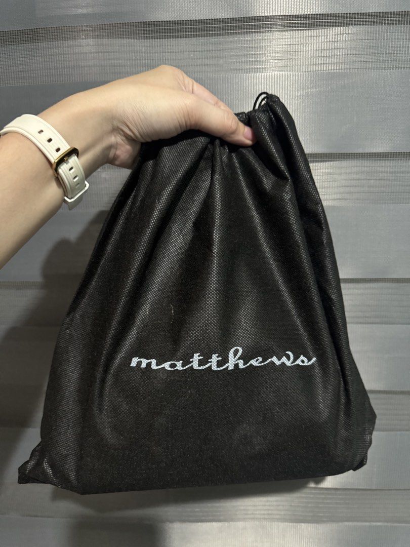 Matthews Beige Patent Leather Top Handle Bag (Category: Shoulder Bags) located in Taguig. Submitted by grayanna (Listing ID 1463248913, Image 3). Description: - Beige patent leather handbag - Brand: Matthews -Daria - Top handles - Detachable shoulder strap - Includes original dust bag - Tag still attached.