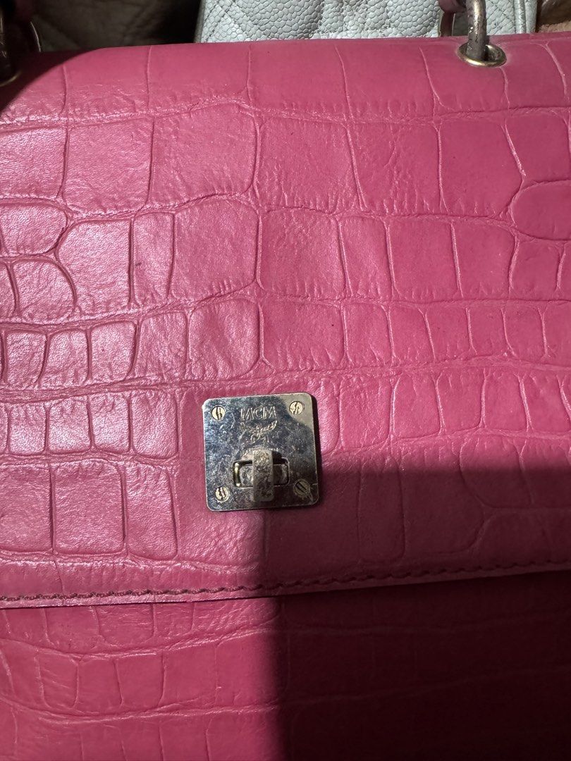 MCM 2 way Bag (Category: Luxury Bags & Wallets) located in Quezon City. Submitted by angel12171984 (Listing ID 1463286783, Image 2). Description: Brand : MCM MADE IN KOREA EMBOSSED CROCS COLOR DARK PINK FADED HARDWEAR with detachable strap Medium size Rank : 7/10 Authentic .
