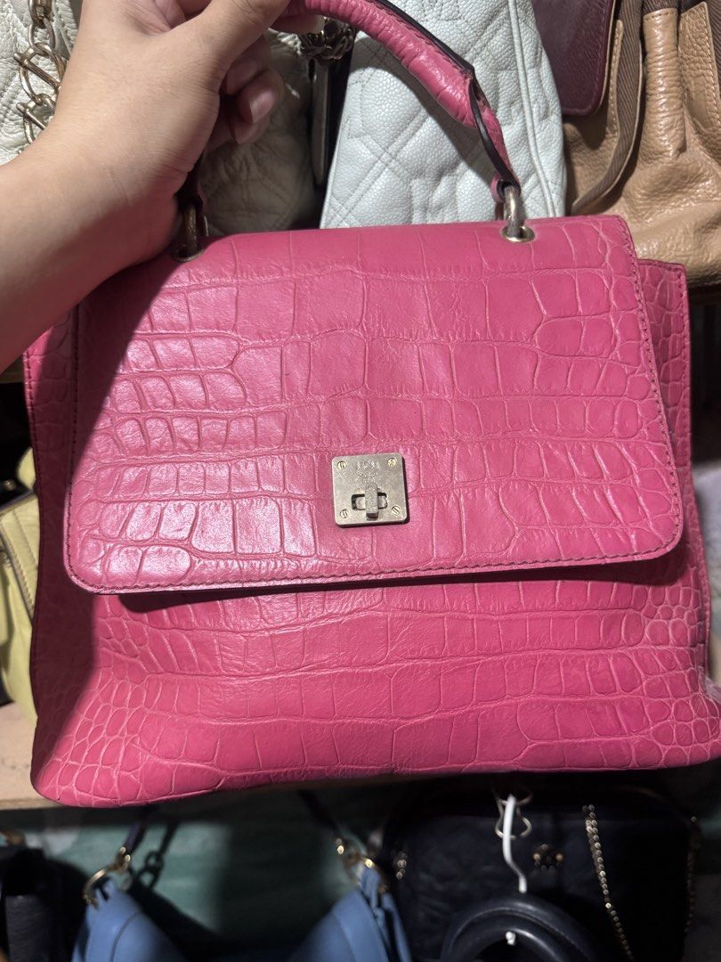MCM 2 way Bag (Category: Luxury Bags & Wallets) located in Quezon City. Submitted by angel12171984 (Listing ID 1463286783, Image 1). Description: Brand : MCM MADE IN KOREA EMBOSSED CROCS COLOR DARK PINK FADED HARDWEAR with detachable strap Medium size Rank : 7/10 Authentic .