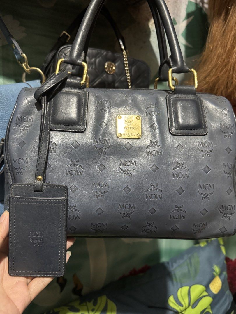Mcm Boston Bag (Category: Luxury Bags & Wallets) located in Quezon City. Submitted by angel12171984 (Listing ID 1463282664, Image 1). Description: Brand : MCM Size : 30cm Style : Boston / speedy style bag Color : Blue Turnable Screw Authentic Rank : 7/10 .