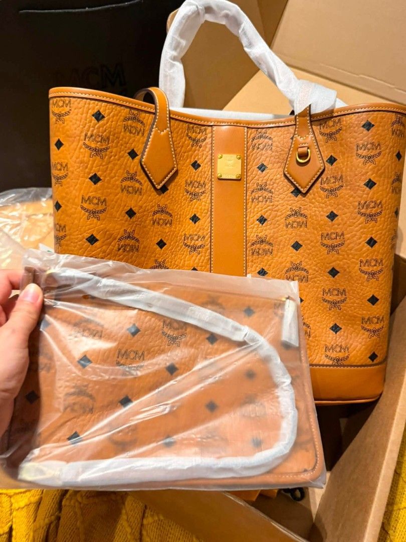 MCM Medium Tote (Category: Luxury Bags & Wallets) located in Manila. Submitted by JustLuxPH (Listing ID 1463148145, Image 1). Description: On Hand PH 😍 Super nice in actual 💯 Original 🔹Actual photos are posted ✅ Complete Inclusions (Paper bag , Dust bag, Pouch, Cards) 🏦 MOP: BDO, BPI, GCASH 🔸 Price is negotiable 📌 Justluxph is not affiliated with any brands featured. All copyrights remain sole property of the brand holders..