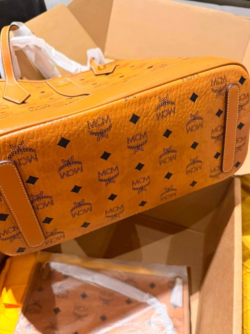 MCM Medium Tote (Category: Luxury Bags & Wallets) located in Manila. Submitted by JustLuxPH (Listing ID 1463148145, Image 3). Description: On Hand PH 😍 Super nice in actual 💯 Original 🔹Actual photos are posted ✅ Complete Inclusions (Paper bag , Dust bag, Pouch, Cards) 🏦 MOP: BDO, BPI, GCASH 🔸 Price is negotiable 📌 Justluxph is not affiliated with any brands featured. All copyrights remain sole property of the brand holders..