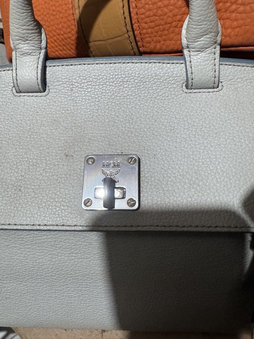 Mcm Milla (Category: Luxury Bags & Wallets) located in Quezon City. Submitted by angel12171984 (Listing ID 1463288290, Image 2). Description: Brand : MCM COLOR : Grey blue Two way bag Made in Korea Authentic Rank : 7.5/10 Small near medium size.