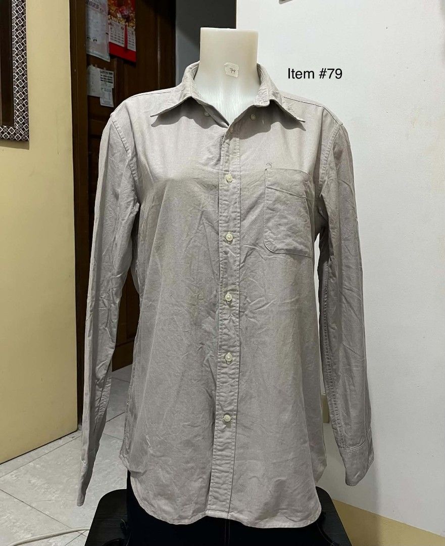 Men's Long-sleeved Button-up Shirt - Grey (Category: Tshirts & Polo Shirts ) located in Quezon City. Submitted by syayayay (Listing ID 1463206993, Image 1). Description: - Grey long-sleeved shirt - Button-up front - Single chest pocket - Classic collar - Suitable for casual or work attire -Slim Fit - with yellow stain on collar.