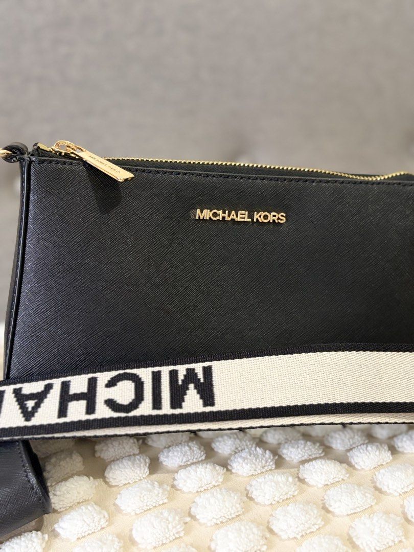 Michael Kors Crossbody Bag (Category: Cross-body Bags) located in Pasig City. Submitted by bagatticph (Listing ID 1463128055, Image 2). Description: Perfect for everyday use!! Good as bnew Selling low since nakastock lang sa cabinet...