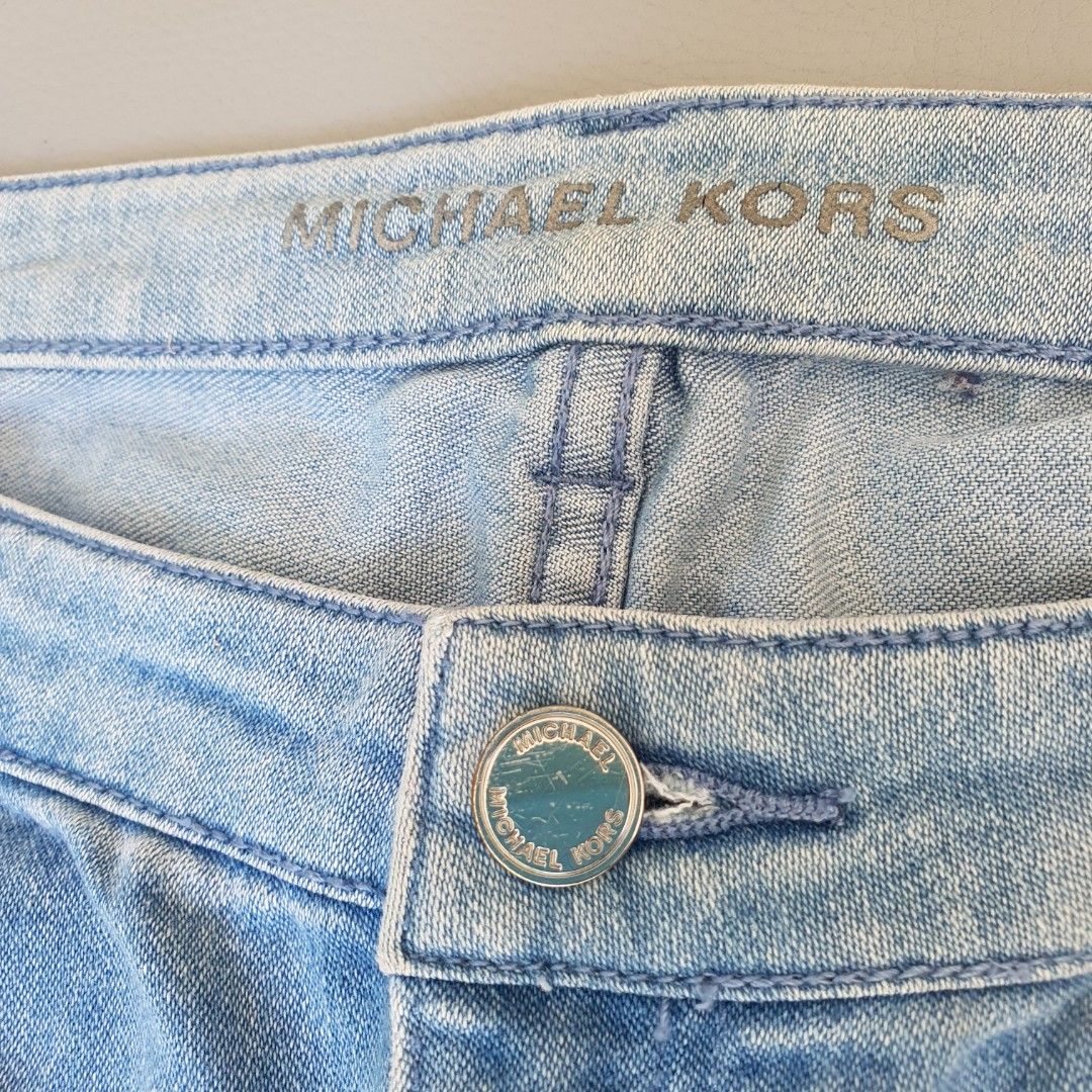Michael Kors Light Wash Denim Jeans (Category: Jeans) located in Laoag. Submitted by soukay (Listing ID 1463127954, Image 3). Description: - Brand: Michael Kors - Style: Light wash denim jeans - Features: Classic five-pocket style, button and zip closure - Detail: Subtle distressing for a worn-in look - Occasion: Great for casual wear.