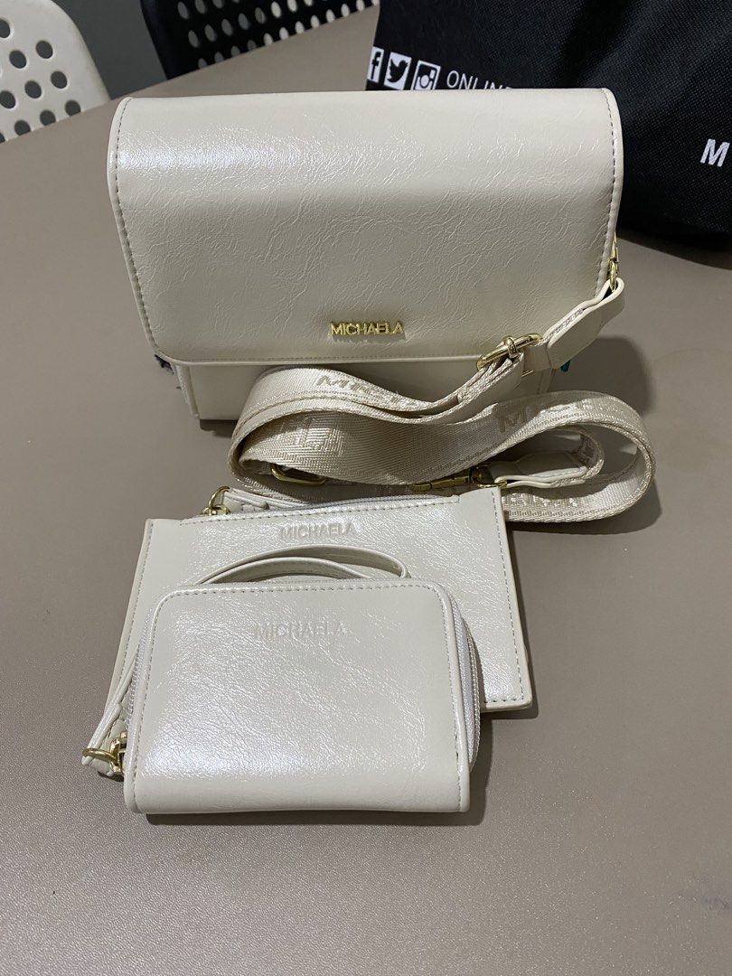 Michaela Crossbody Bag with 2 purses (Category: Cross-body Bags) located in Quezon City. Submitted by challelscloset (Listing ID 1463230843, Image 1). Description: never used decluttering.