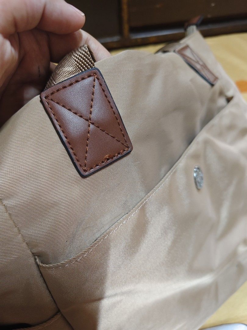 Michaela Tote Bag with Pouch (Category: Tote Bags) located in General Mariano Alvarez. Submitted by findsandmoreph (Listing ID 1463175361, Image 3). Description: - Lightweight Michaela tote bag - Comes with a matching pouch - Zippered main compartment - Exterior pockets for easy access - Comfortable straps for easy carrying - Ideal for everyday use or travel - Versatile neutral color - Includes original dust bag.