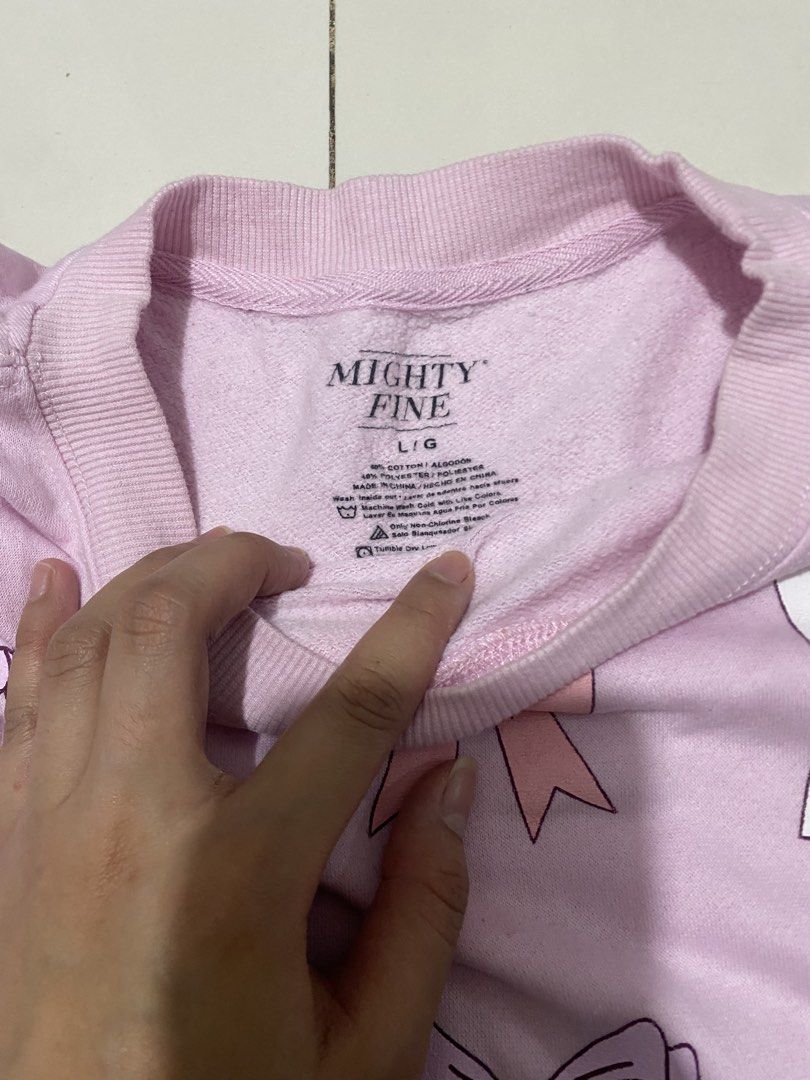 Mighty Fine Pink Bow Print Sweatshirt L (Category: Longsleeves) located in Baguio. Submitted by _strawberrymilk_ (Listing ID 1463320631, Image 3). Description: - Adorable pink sweatshirt - Features a charming all-over print of pastel-colored bows - Classic crew neck and long sleeves - Comfortable cotton blend fabric - Ideal for everyday casual wear.