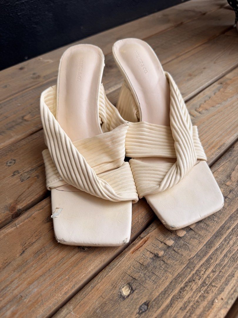 MILLOT & CO. Cream Ribbed Square Toe Mules Heels (Category: Heels) located in Tuguegarao City. Submitted by joysmithznjo (Listing ID 1463201991, Image 2). Description: - Brand: MILLOT & CO. - Color: Cream - Style: Mules - Features: Ribbed strap across foot, square toe, block heel - Condition: Shows some scuffs on the toe and dirty soles. Please check photos for detailed condition..