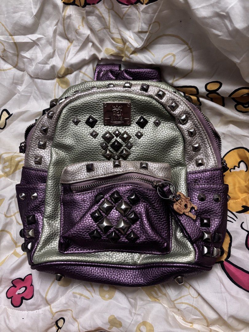 mini backpack (Category: Backpacks) located in Taguig. Submitted by megdeclutterz (Listing ID 1463256711, Image 1). Description: - small bag - not branded - with adjustable strap - approx. 10x10 inches - working zippers - few scratches ‼️ negotiable ‼️ please manage your expectations ‼️ Taguig/Bgc location.