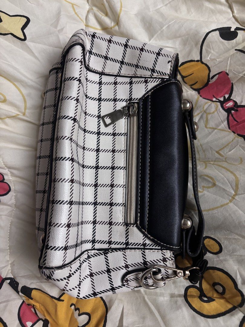 mini checkered bag (Category: Purses & Pouches) located in Taguig. Submitted by megdeclutterz (Listing ID 1463255074, Image 3). Description: - small bag - not branded - with strap - approx. 6x10 inches - working zippers - few scratches ‼️ negotiable ‼️ please manage your expectations ‼️ Taguig/Bgc location.