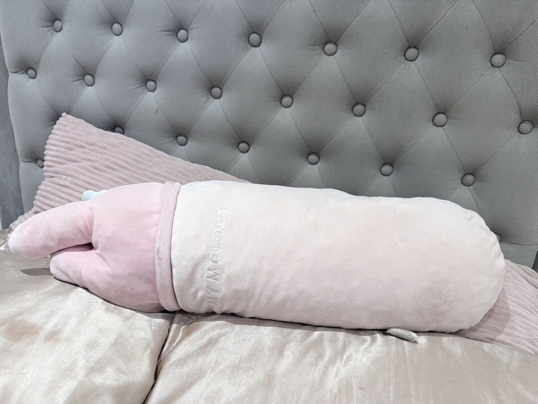 MINISO My Melody Long Pillow (Category: Bed Frames & Mattresses) located in Manila. Submitted by strawberrymelo (Listing ID 1463170330, Image 2). Description: - preloved! needs cleaning.