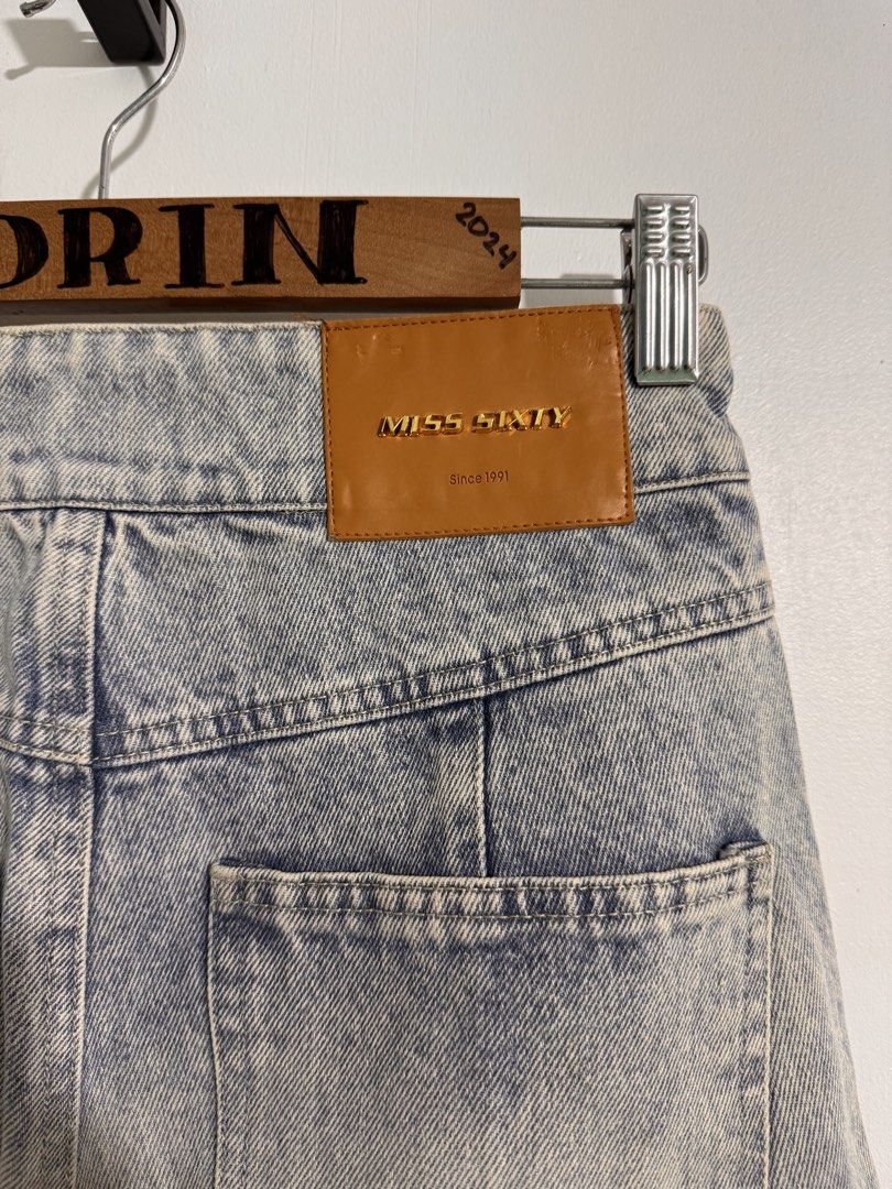 Miss Sixty Light Wash Denim Jeans (Category: Jeans) located in Cavite. Submitted by aldrindela40142 (Listing ID 1463165568, Image 3). Description: - Brand: Miss Sixty - Wash: Light wash denim - Cut: Straight leg - Size: 27-28 - Features: Signature Miss Sixty button, leather patch at the back - Style: Great for casual wear.