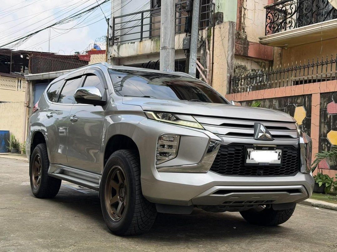 Mitsubishi Montero Sport GLS Auto (Category: Used Cars) located in Manila. Submitted by quality_cars (Listing ID 1463237363, Image 2). Description: 2021 Mitsubishi Montero GLS 2.4L Diesel Automatic Transmission (Paddle Shifter) 51T Mileage Sterling Silver Metallic 4x2 Push Start Smart Entry Power Retractable Sidemirrors Electronic Parking Brake Auto Brake Hold Leather Seatcover All Led Lights 360 Camera Drl 18s Te37 Mags with Thick Tires Full Exh