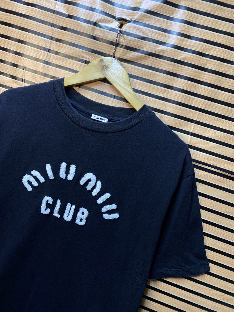 MIU MIU CLUB TEE (Category: Tshirts & Polo Shirts ) located in Makati City. Submitted by drip.poww (Listing ID 1463292343, Image 2). Description: - Authentic Miu Miu - Color: Black - Size: Meduim - Dimes: 21x27 - Authentic - Excellent condition - Need wash, fresh from bale - Material: 100% Cotton Please don’t expect too much—these are thrifted (ukay) items. 😊 !!STILL NEGOTIABLE!!.