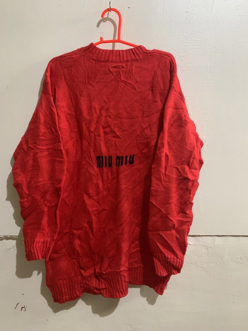 Miu Miu Red Mickey Mouse Knit Sweater (Category: Longsleeves) located in Marawi City. Submitted by biidnillah (Listing ID 1463273058, Image 2). Description: - Red knit sweater - Features a white Mickey Mouse graphic - Crew neck, long sleeves - Ribbed cuffs and hem - Estimated size: Medium - dimes:w20L30 -nego or best offer.