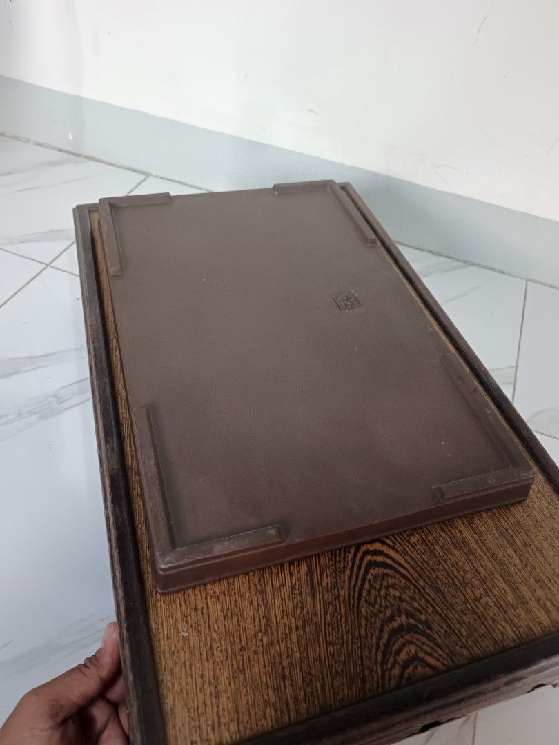 Mizushoen Japanese-made earthenware rectangular bonsai pot water basin, size 13, (Category: Pots & Planters) located in Binangonan. Submitted by kurama04 (Listing ID 1463218578, Image 3). Description: Good condition 2500pesos. with wooden vintage bonsai stand set of 4000php with markings! from japan Tokoname ware, established in 1935..
