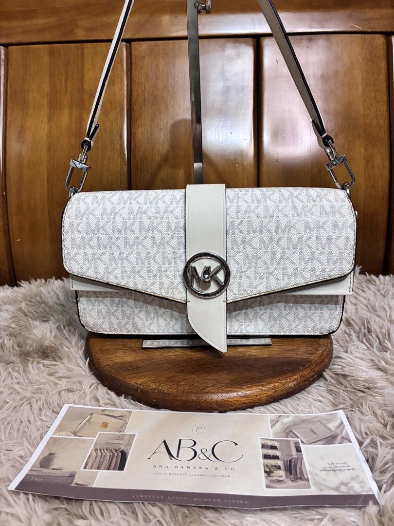 MK Greenwich Crossbody Bag (Category: Shoulder Bags) located in Subic. Submitted by anabananaco. (Listing ID 1463235053, Image 2). Description: Guaranteed authentic 👌 Preloved Bags 💼👜 From Japan 🇯🇵🎌 Issues: - no more sling strap - waves on rubber lining .